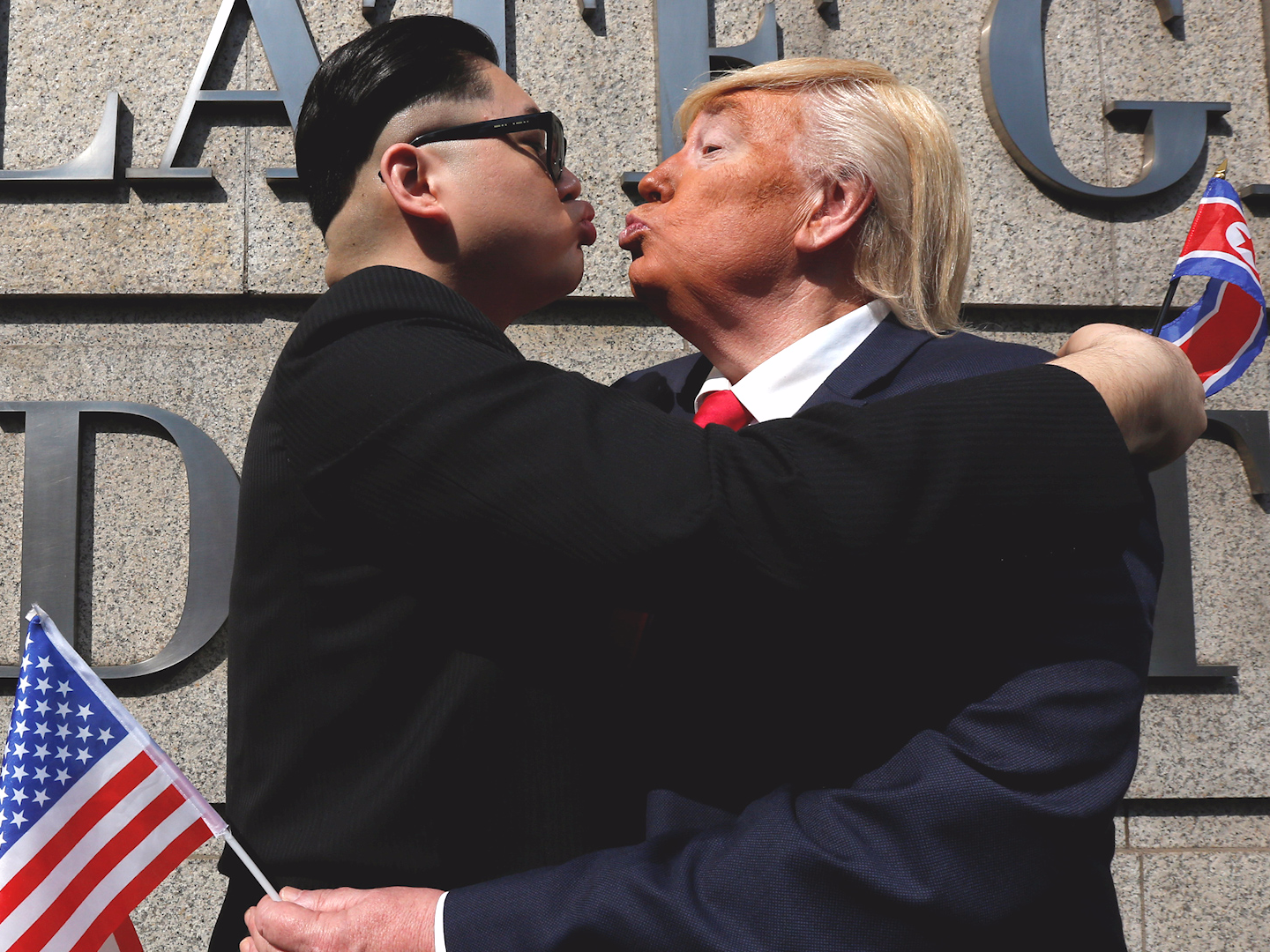 donald trump kim jong un lookalikes kiss